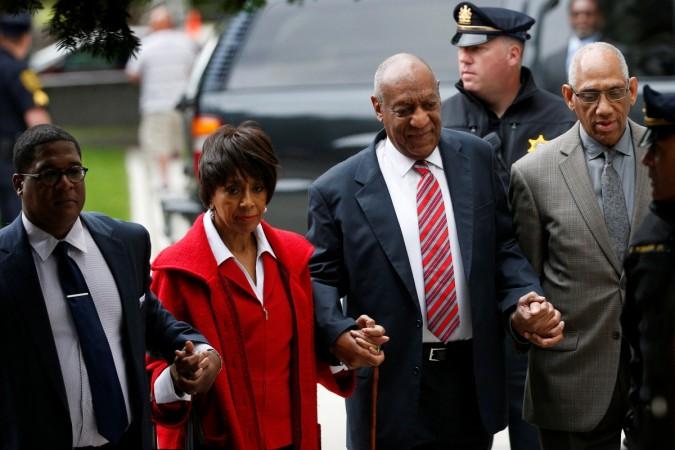 Actor and comedian Bill Cosby (C) arrives with actor Sheila Frazier (2-L) and John Atchison (R) for the third day of his sexual assault trial at the Montgomery County Courthouse in Norristown, Pennsylvania. Bill Cosby