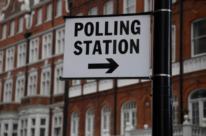 A polling station sign is seen in London, Britain. polling station