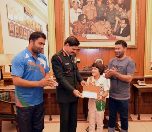 Chief of Army Staff, General Dalbir Singh felicitate Tajamul Islam, winner of the Gold Medal in World Sub Junior Kickboxing Championship in New Delhi on Nov 16, 2016 tajamul islam, kickboxing