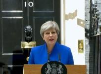 Theresa May announces new government with DUP