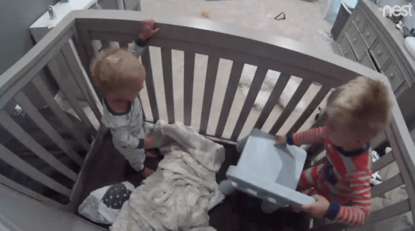 The video of elder brother teaching young toddler to escape from crib goes viral on social media. baby video, viral baby video, baby crib escape
