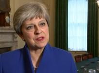 May says sorry to MPs who lost seats after election debacle