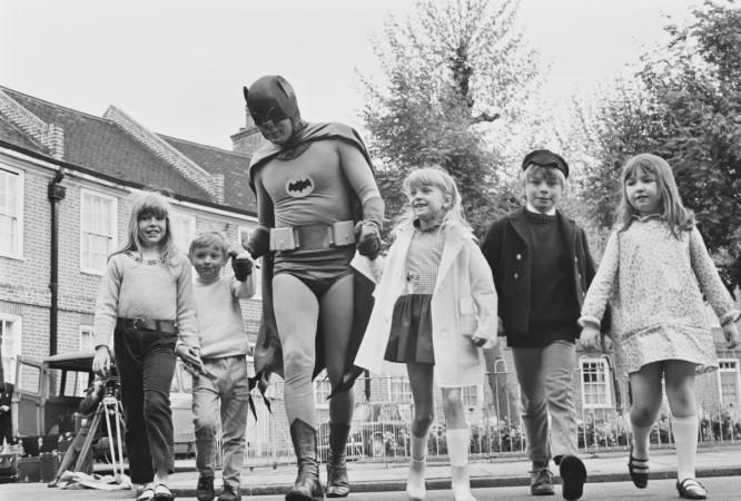 American actor Adam West dressed as 'Batman' for the filming of a road safety advert for children, 7th May 1967. (Photo by Watson/Express/Hulton Archive/Getty Images Adam West as Batman