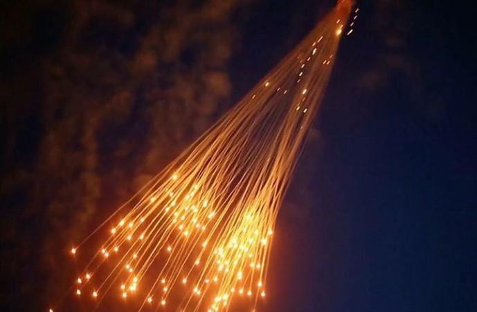 In picture: White phosphorus munitions being used over Raqqa in Syria in early June 2017. White phosphorus