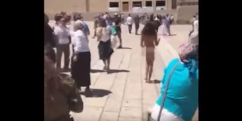 Naked woman entered the men's section in front of Jerusalem's holy Western Wall Naked woman in Western Wall of Jerusalem