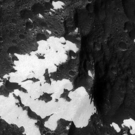 Cassini zooms in, for the first time, on the patchy, bright and dark mountains originally identified in images from NASA's Voyager spacecraft taken more than 25 years earlier. The image was acquired during Cassini's only close flyby of Iapetus, a two-toned moon of Saturn. nasa, Cassini, spacecraft, Saturn, Iapetus, Saturn's moon, moon, space,