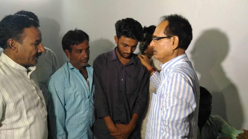 In picture: Madhya Pradesh Chief Minister Shivraj Singh Chouhan (right) meets the kin of deceased farmers on June 10, 2017. Shiv