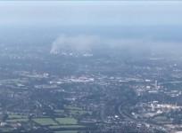 Large plumes of smoke from London tower fire seen from aboard plane