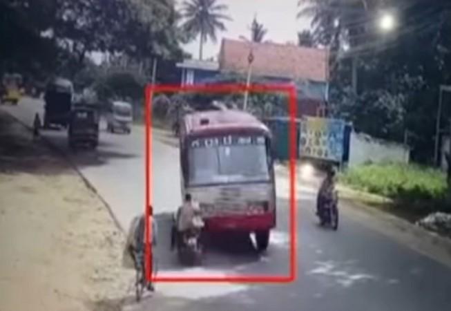 The accident caught on camera. Killer KSRTC Rams into Biker