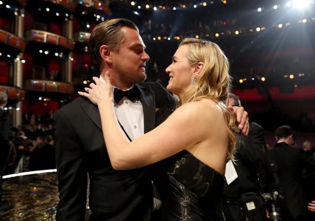 Actor Leonardo DiCaprio (L) and Kate Winslet attend the 88th Annual Academy Awards at Dolby Theatre on February 28, 2016 in Hollywood, California. Leonardo DiCaprio