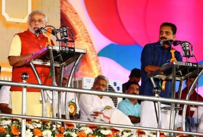 aNarendra Modi and K Surendran Narendra Modi, K Surendran, translation