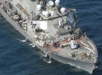 The Arleigh Burke-class guided-missile destroyer USS Fitzgerald. damaged by colliding with a Philippine-flagged merchant vessel. is seen off Shimoda, Japan in this photo taken by Kyodo June 17, 2017.