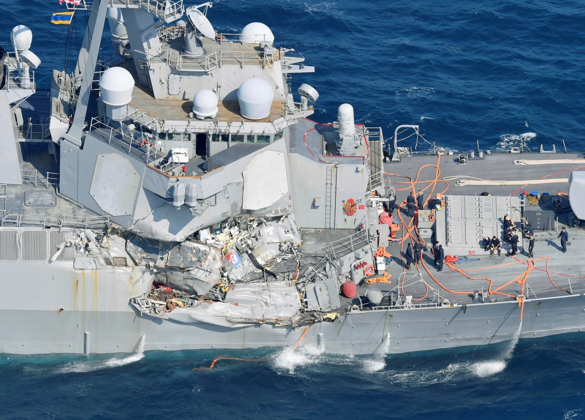 The Arleigh Burke-class guided-missile destroyer USS Fitzgerald, damaged by colliding with a Philippine-flagged merchant vessel, is seen off Shimoda, Japan in this photo taken by Kyodo June 17, 2017. The Arleigh Burke-class guided-missile destroyer USS Fitzgerald, damaged by colliding with a Philippine-flagged merchant vessel, is seen off Shimoda, Japan in this photo taken by Kyodo June 17, 2017.