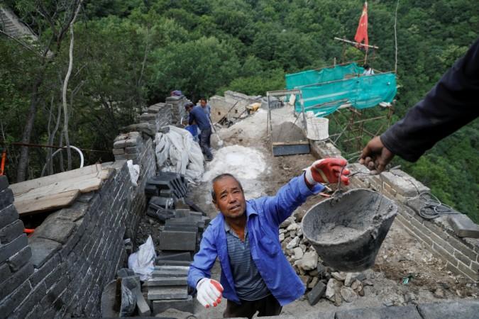 People work on the reconstruction of the Jiankou section.