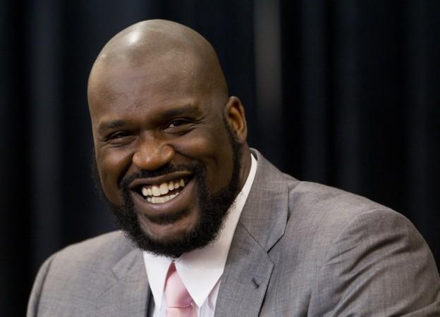Shaquille O'Neal laughs while telling a story during his announcement of his retirement from the National Basketball Association (NBA) at a news conference at his home in Windermere, Florida. Shaquille O'Neal