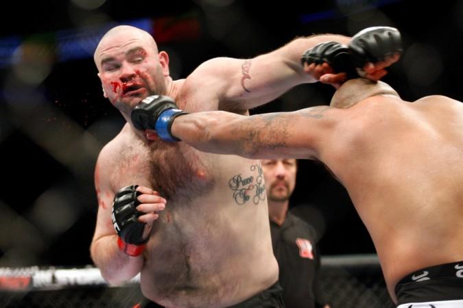 Joey Beltran (R) punches Tim Hague in their heavyweight bout at UFC 113 at Bell Centre on May 8, 2010, in Montreal, Quebec, Canada ufc