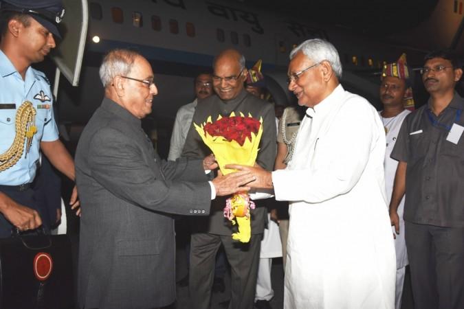 President Pranab Mukherjee being welcomed by Bihar Governor Ram Nath Kovind and Chief Minister Nitish Kumar at Jaiprakash Narayan International airport in Patna on Aug 26, 2016. (Photo: IANS) President Pranab Mukherjee being welcomed by Bihar Governor Ram Nath Kovind and Chief Minister Nitish Kumar at Jaiprakash Narayan International airport in Patna on Aug 26, 2016. (Photo: IANS)