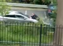 Man wanted for assault after driving away with police officer on his bonnet