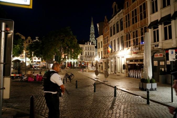 A policeman stands guard over a deserted street following an explosion at Central Station in Brussels, Belgium, June 20, 2017. Central Station in Brussels