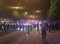 Riot police and youths armed with knives clash in London