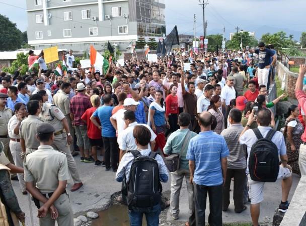 GJM workers participate in a rally organised to press for separate state of Gorkhaland in Siliguri on June 21, 2017. gorkhaland, sikkim cm backs gorkhaland demand, sikkim cm Pawan Kumar Chamling, gjm chief bimal gurung