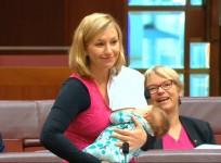 Australian senator breastfeeds baby whilst moving a motion for first time