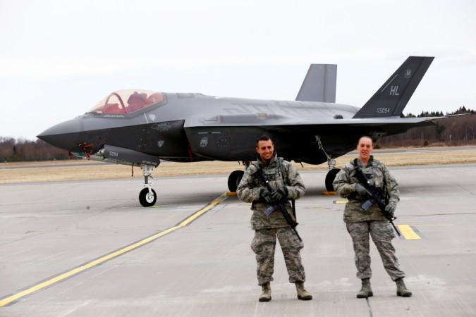 U.S. soldiers guard U.S. Air Force F-35A Lightning II fighter in Amari air base, Estonia, April 25, 2017. U.S. soldiers guard U.S. Air Force F-35A Lightning II fighter in Amari air base, Estonia