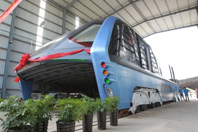 A model of an innovative street-straddling bus called Transit Elevated Bus is seen after a test run in Qinhuangdao, Hebei Province, China, August 3, 2016. Transit Elevated Bus