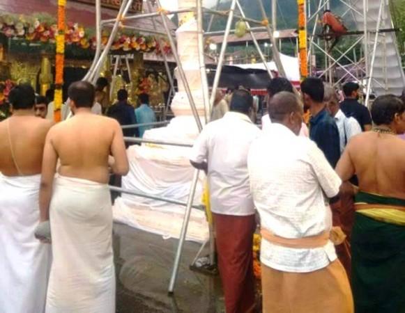 In picture: The new golden flag mast at the Sabarimala Ayyappa temple is covered with white cloth after vandalism on Sunday, June 25, 2017. Sabarimala