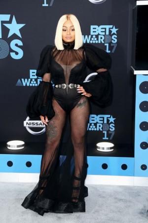 Blac Chyna sizzles in her semi-sheer black dress. Blac Chyna
