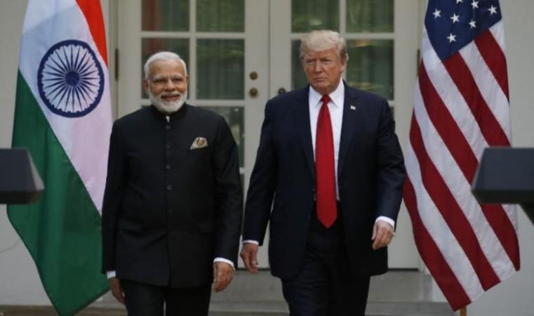 US President Donald Trump (R) arrives for a joint news conference with Indian Prime Minister Narendra Modi in the Rose Garden of the White House in Washington Modi US visit