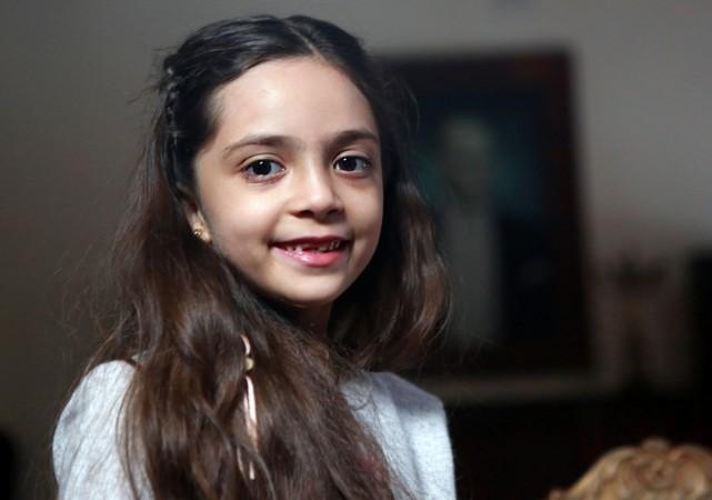 Syrian girl Bana al-Abed, known as Aleppo's tweeting girl, poses during an interview in Ankara, Turkey, on December 22, 2016. The young Syrian girl was one of thousands of people evacuated from once rebel-held areas of Aleppo in the last days under a deal brokered by Turkey and Russia. Bana Alabed