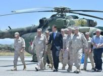 Syrian President Bashar al-Assad visits air base in western Syria