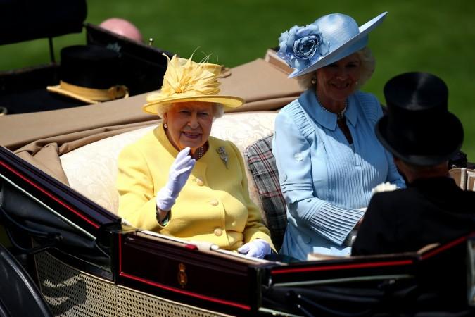 Queen Elizabeth II and Camilla, Duchess of Cornwall make their way to the grandstand during day 2 of Royal Ascot at Ascot Racecourse on June 21, 2017 in Ascot, England. Camilla, Duchess of Cornwall