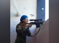 Female Kurdish fighter laughs after nearly being shot by Isis sniper