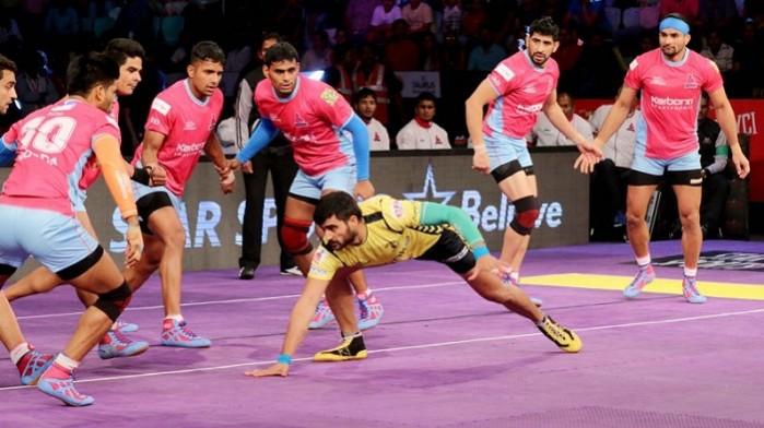 Telugu Titans captain Rahul Chaudhari (in yellow) Rahul Chaudhari, Telugu Titans, Jaipur Pink Panthers, PKL, Season 5