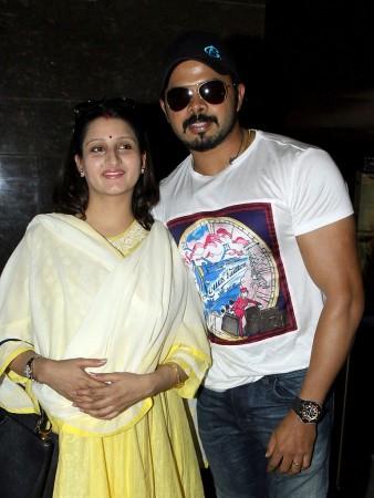 Former Indian cricketer Shanthakumaran Sreesanth (R) and his wife at a press show of a film Former Indian cricketer Shanthakumaran Sreesanth (R) and his wife at the press show of a film
