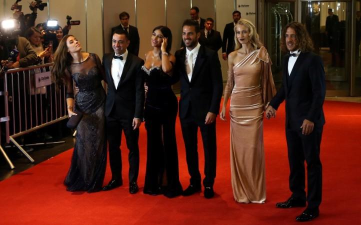 Xavi, Cesc Fabregas and Carles Puyol along with their partners at Messi's wedding Messi's teammates at his wedding