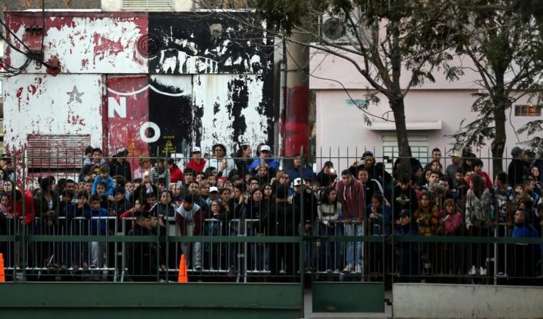 Fans outside the hotel waiting to catch a glimpse of their favourite star Messi wedding