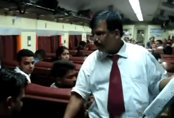 In picture: A TTE aboard the Gujarat Queen Express on July 1 asks passengers to pay Rs 20 each on account of GST. GST