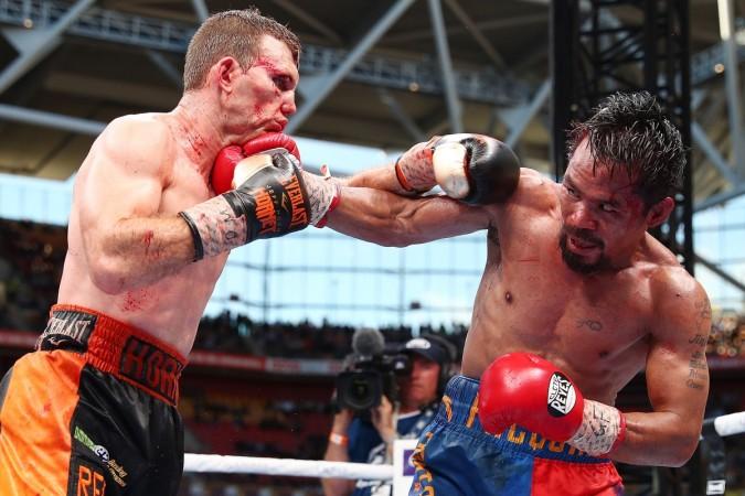Victorious Jeff Horn (L) took his career record to 17-0-1 Manny Pacquiao
