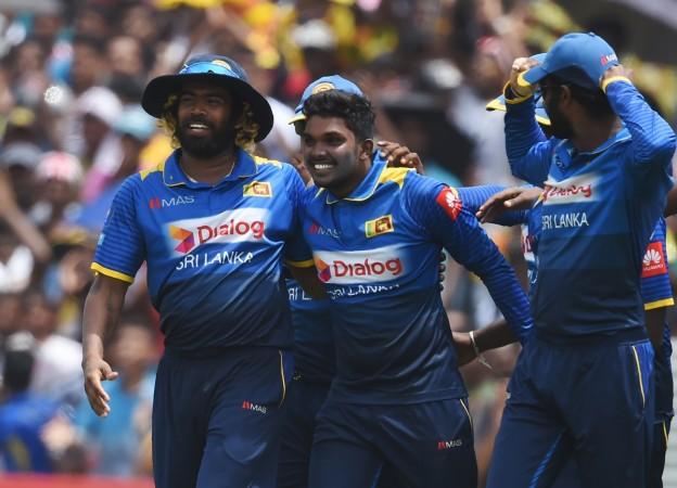 Wanidu Hasaranga celebrates with teammates after picking a hat-trick on debut Wanidu Hasaranga