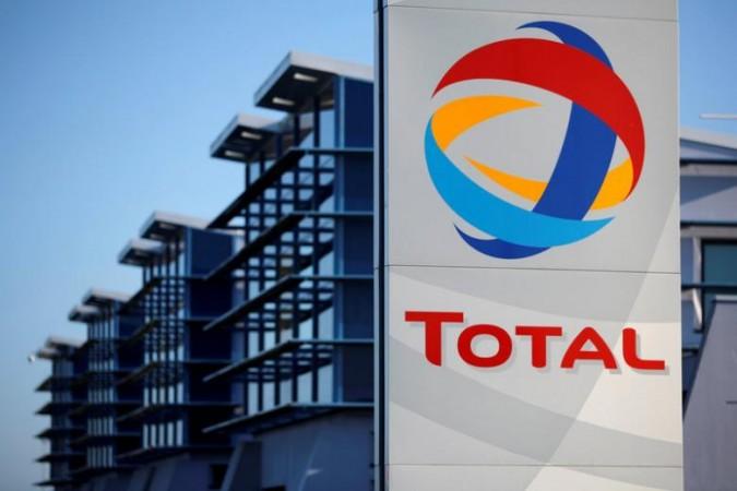 The logo of French oil giant Total is seen in front of the oil refinery of Donges, near Nantes, France Total
