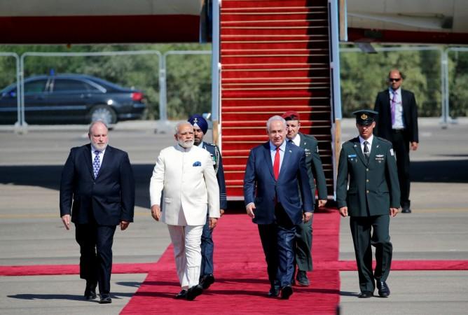 Israeli Prime Minister Benjamin Netanyahu (2nd R) welcomes Indian Prime Minister Narendra Modi (2nd L) during an official welcoming ceremony upon his arrival in Israel at Ben Gurion Airport, near Tel Aviv, Israel July 4, 2017. Modi Israel