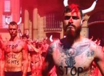 Nearly naked PETA activists fill the sky with blood in protest of bullfighting