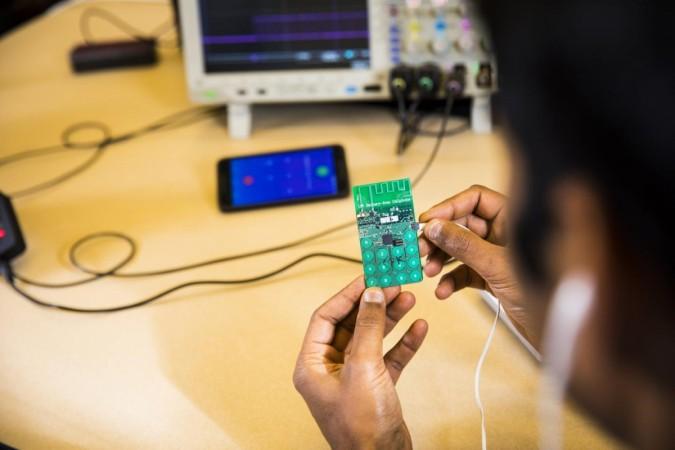 The battery-free phone developed at the UW can sense speech, actuate the earphones, and switch between uplink and downlink communications, all in real time. It is powered by either ambient radio signals or light. battery-free phone