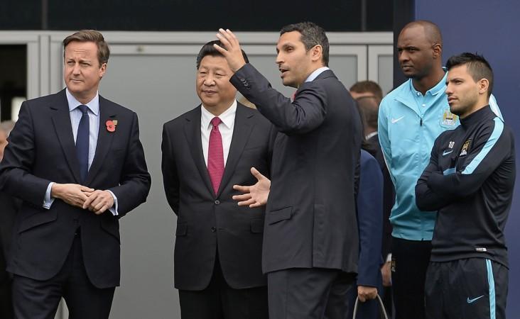 China President Xi Jinping (2nd from left) at Manchester City's academy Xi Jinping