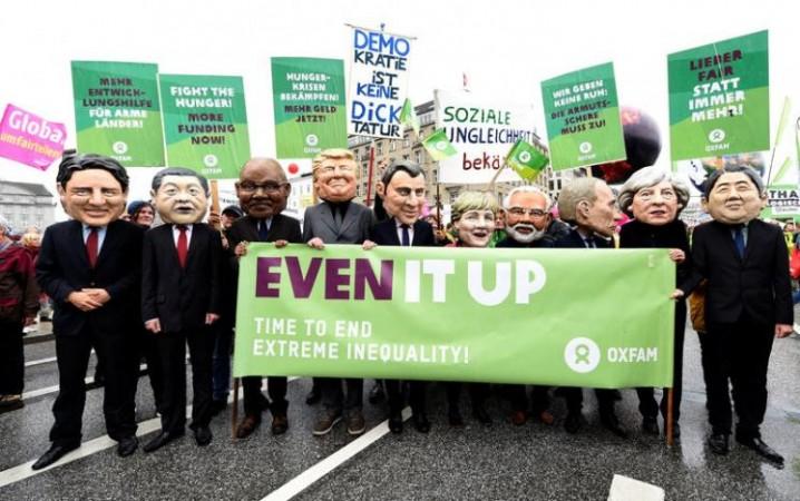 Oxfam's Big Heads depict G20 leaders take part in protests ahead of the upcoming G20 summit in Hamburg, Germany July 2, 2017. G20 protest