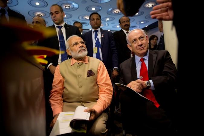 Prime Minister Narendra Modi and Israeli Prime Minister Benjamin Netanyahu attend an Innovation conference with Israeli and Indian CEOs in Tel Aviv on July 6, 2017. REUTERS/Oded Balilty Modi Israel