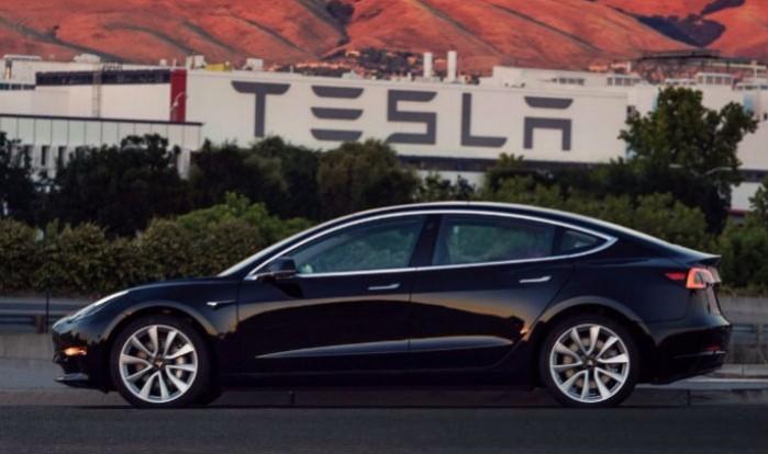 1st Tesla Model 3 unit for commercial sale Tesla Model 3 photo